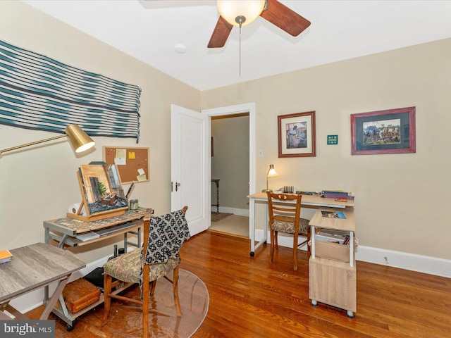 office space with ceiling fan and hardwood / wood-style floors