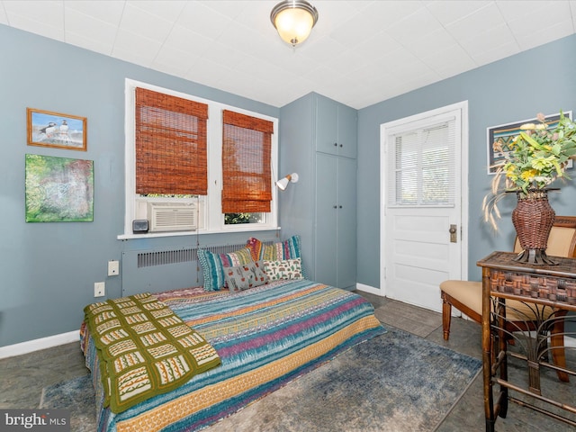 bedroom with cooling unit and radiator