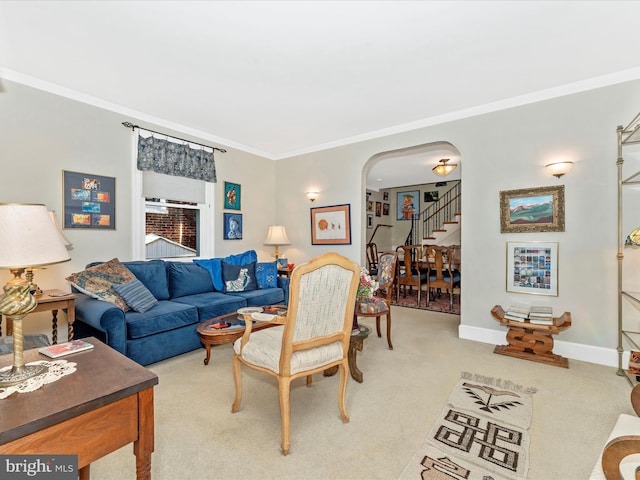 living room featuring crown molding and light colored carpet