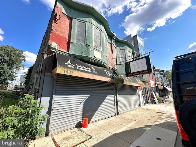 view of property exterior with a balcony