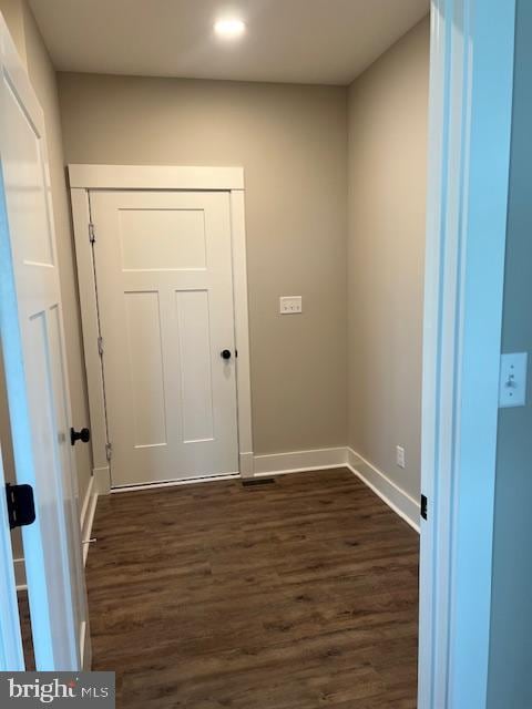 doorway to outside featuring dark hardwood / wood-style floors