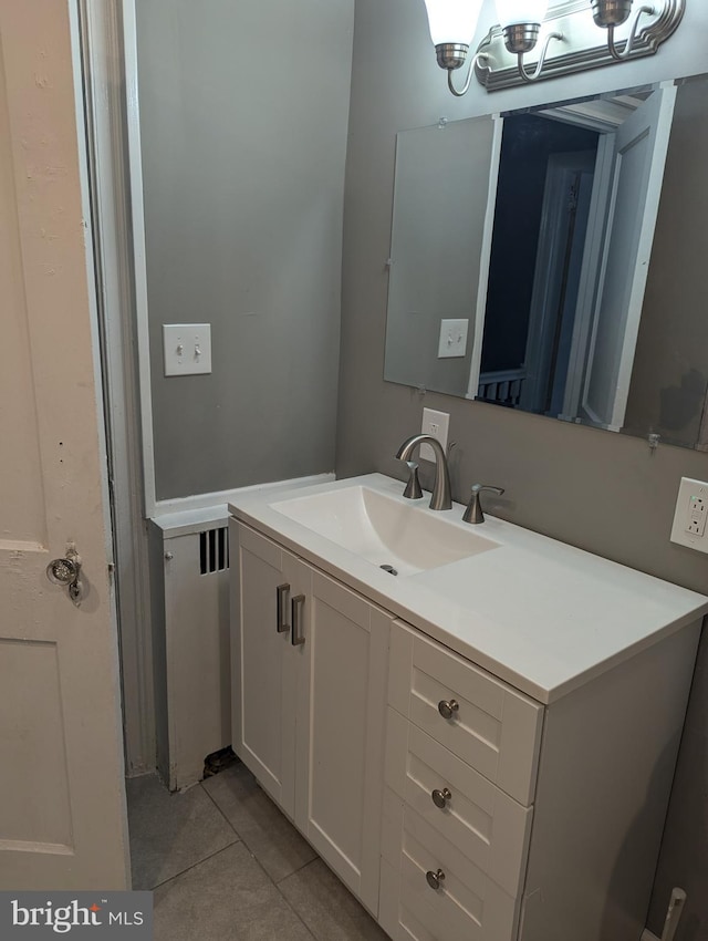 bathroom featuring vanity and tile patterned flooring