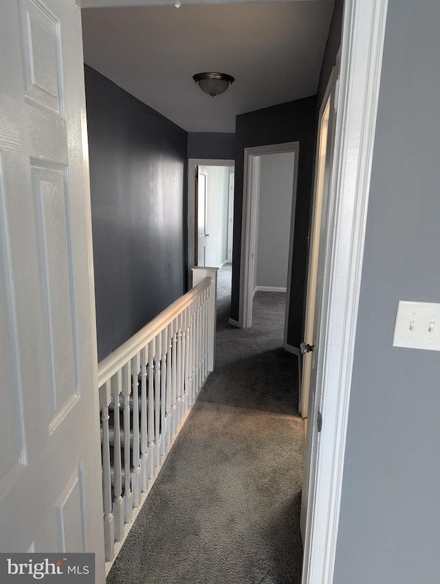 corridor with carpet floors