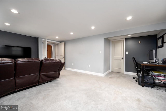 living area featuring recessed lighting, baseboards, and light colored carpet