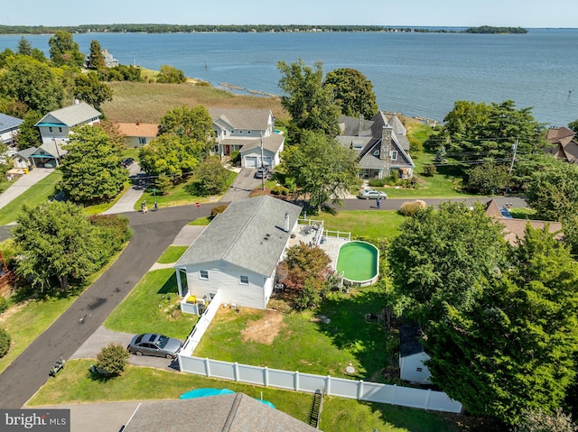 birds eye view of property featuring a residential view and a water view