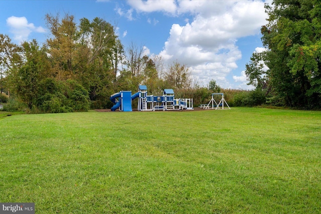 view of yard featuring playground community
