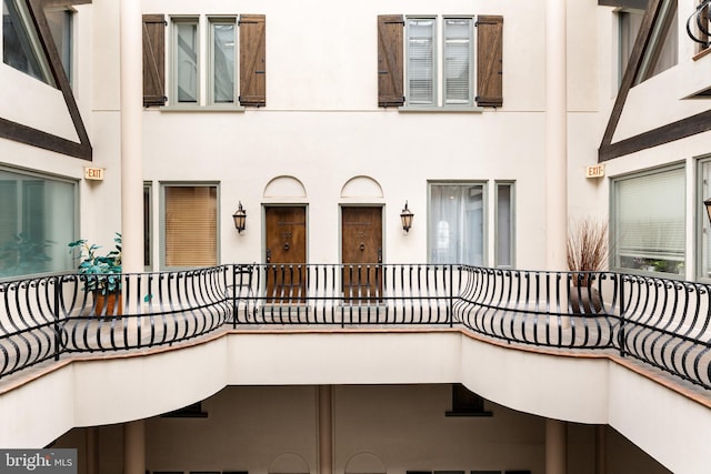 interior space with a balcony