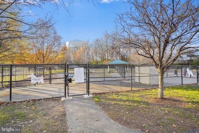 exterior space with tennis court