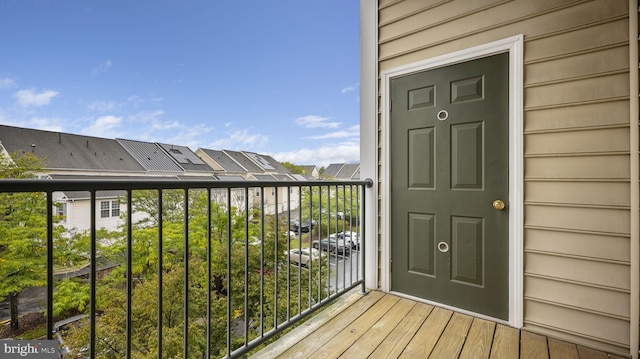 doorway to property featuring a balcony