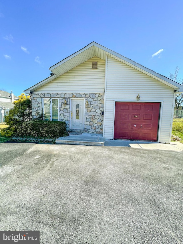 view of front of property featuring a garage