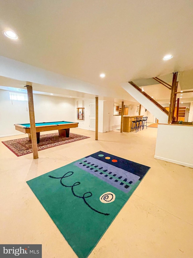 game room with pool table and concrete floors