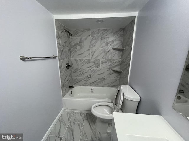 bathroom with baseboards, marble finish floor, shower / bathing tub combination, and toilet