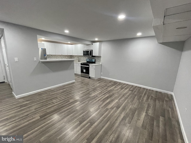 interior space with dark hardwood / wood-style floors