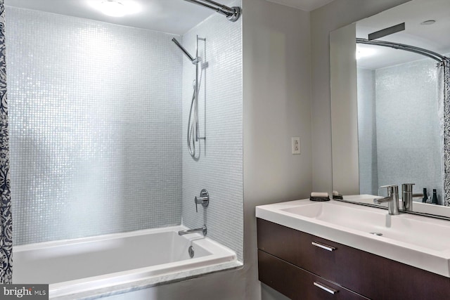 bathroom with vanity and shower / bath combination with curtain