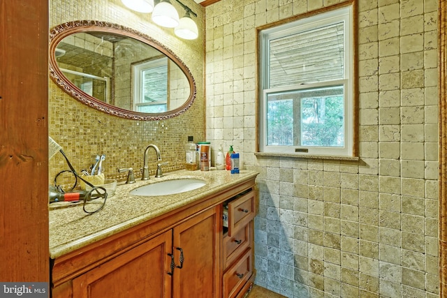 bathroom with backsplash and vanity