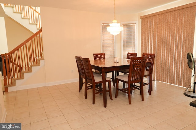 dining space with a notable chandelier