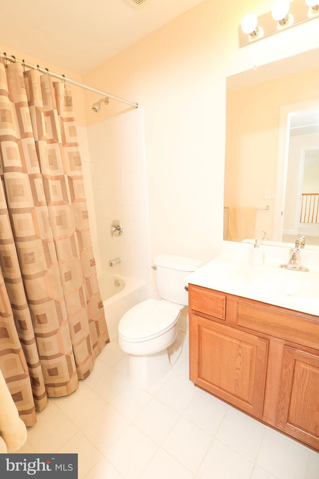 full bathroom with tile patterned flooring, shower / bath combo, vanity, and toilet