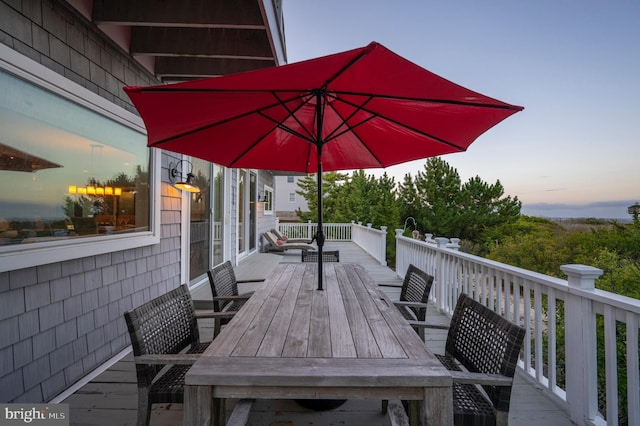 patio terrace at dusk with a deck