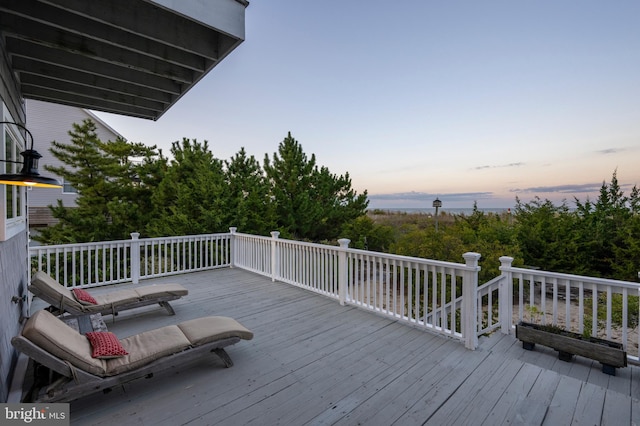 view of deck at dusk