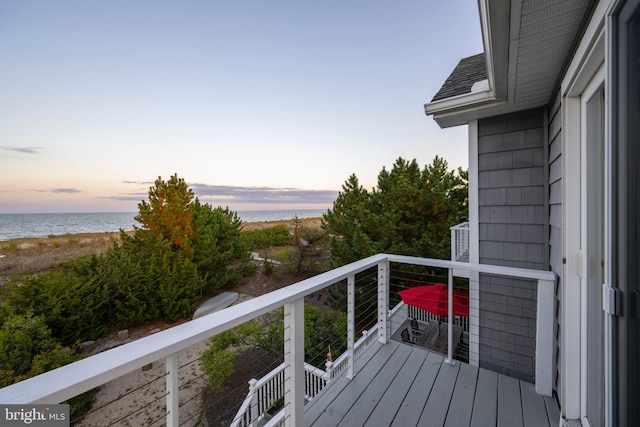 deck at dusk with a water view