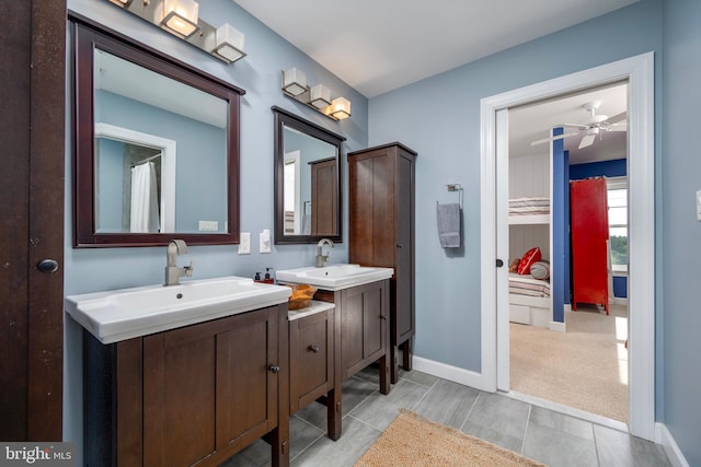 bathroom with vanity, ceiling fan, and tile patterned floors