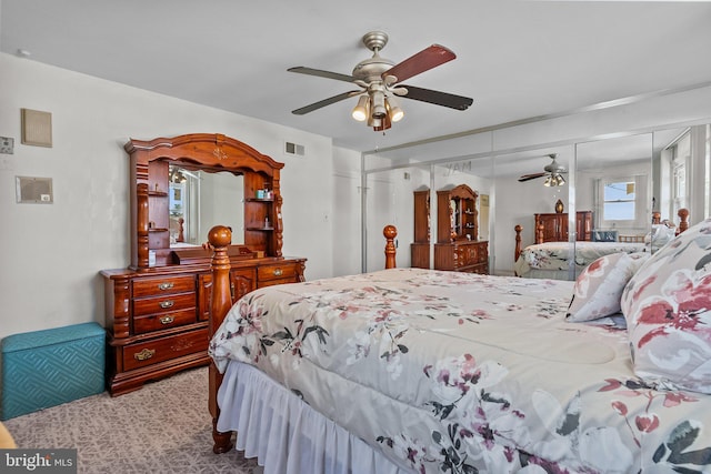 bedroom featuring a closet and ceiling fan