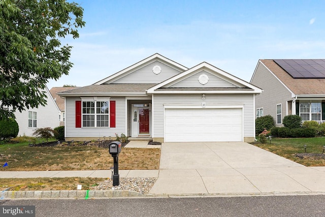 ranch-style home featuring a garage