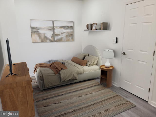 bedroom with light wood-type flooring