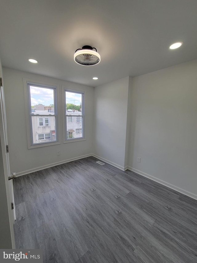 empty room featuring dark hardwood / wood-style floors