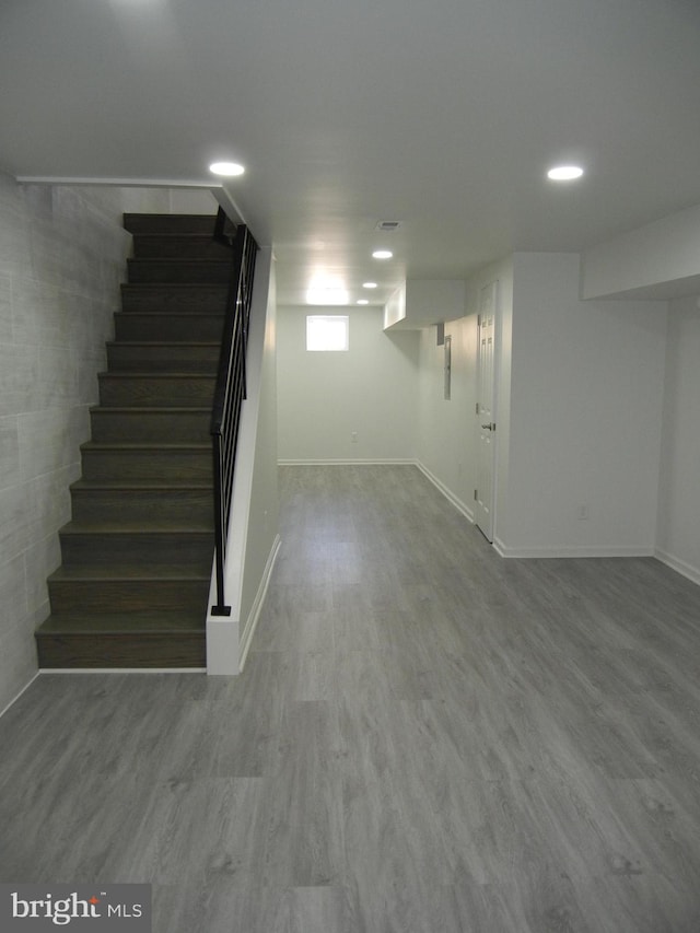 basement with wood-type flooring