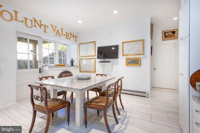 dining area with baseboard heating