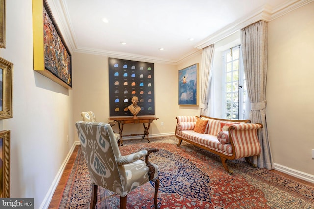 sitting room with ornamental molding