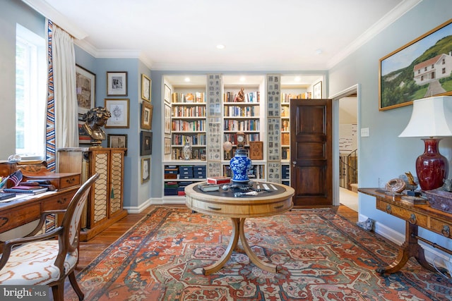 interior space with ornamental molding, built in features, and dark hardwood / wood-style floors