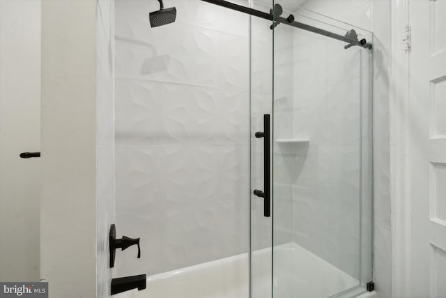 bathroom featuring an enclosed shower