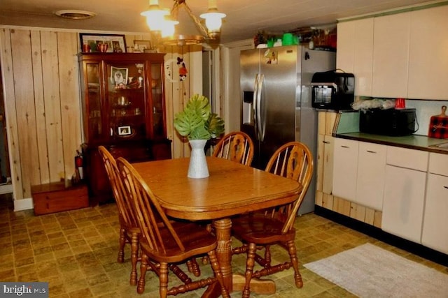 dining room with a chandelier