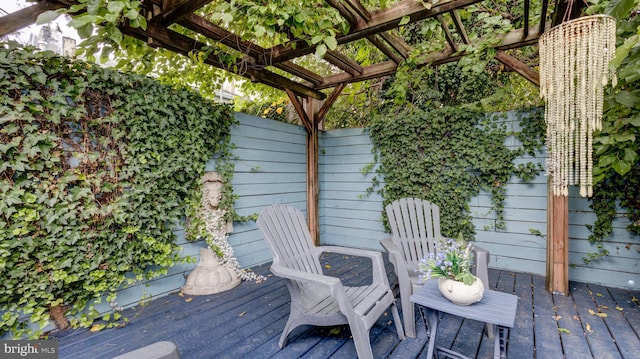 wooden deck with a pergola