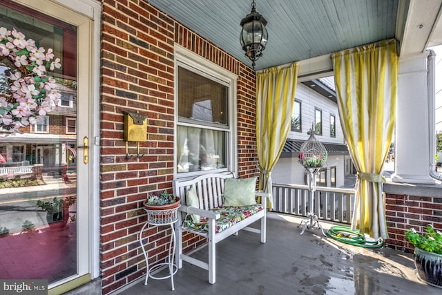 exterior space featuring covered porch