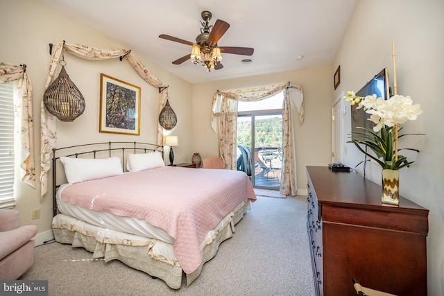 carpeted bedroom with access to outside and ceiling fan