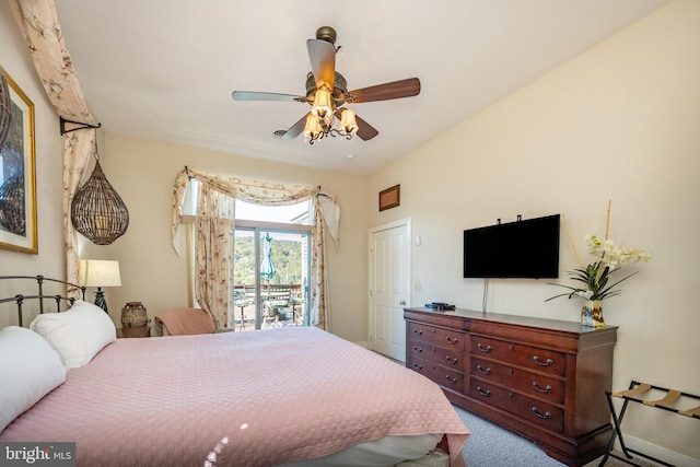 carpeted bedroom featuring access to outside and ceiling fan