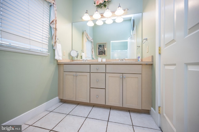 bathroom featuring vanity and tile patterned flooring