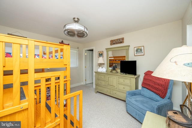 bedroom with light carpet