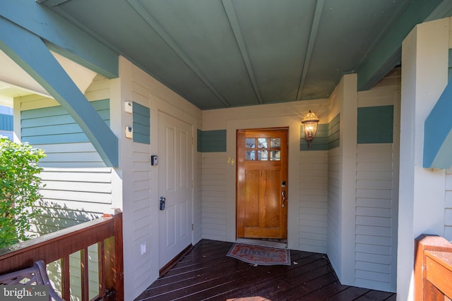 entrance to property featuring a deck