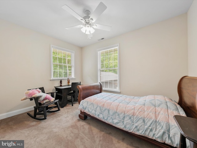 carpeted bedroom featuring ceiling fan