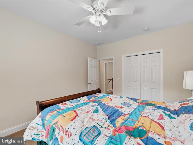 bedroom with ceiling fan, a closet, and carpet floors