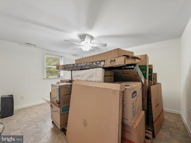 storage area with ceiling fan