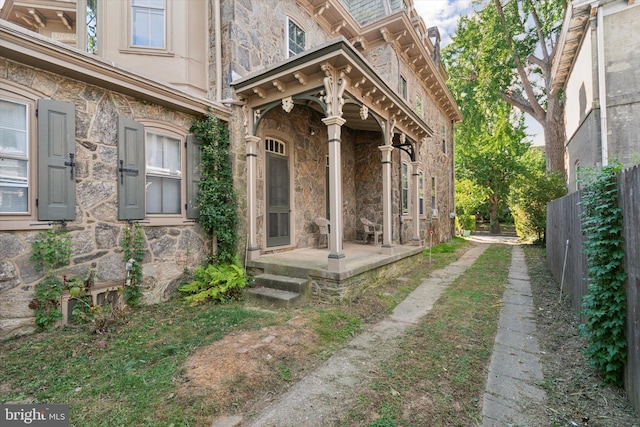 entrance to property with a porch