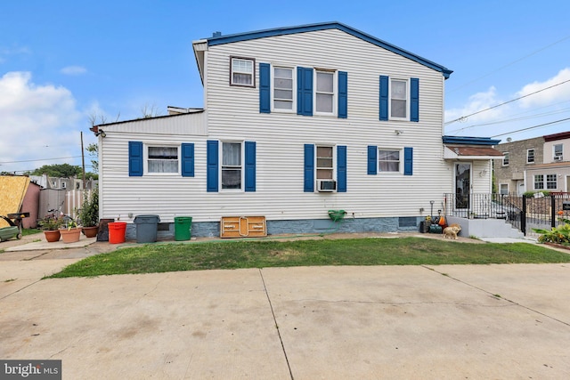 view of front of house featuring cooling unit