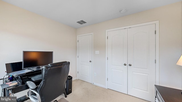 office area with light colored carpet