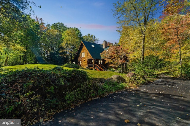 view of property exterior at dusk