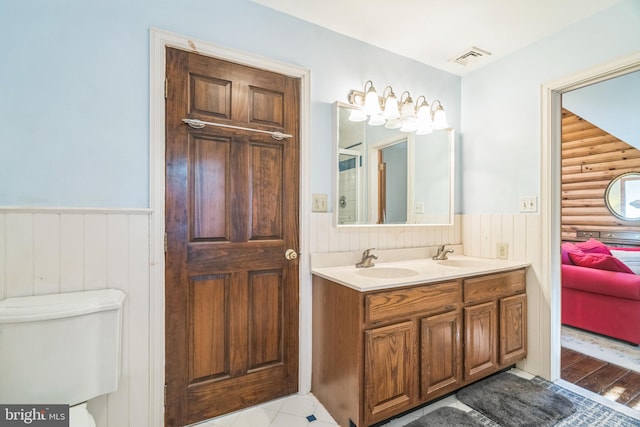 bathroom featuring vanity and hardwood / wood-style flooring